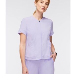 Used Jaanuu Women's Tulip Zip Scrub Top lilac size medium